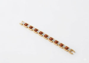 Premium Rudraksha Bracelet with Golden and Silver Bead Accents for Spiritual Wear