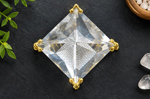 Feng Shui Crystal Pyramid with Golden Stand Vastu Showpiece
